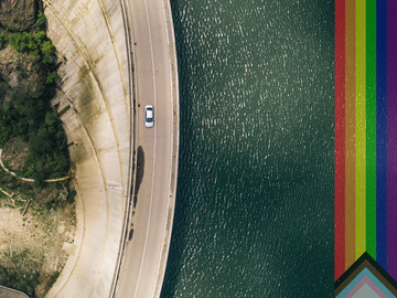 Birds eye view of green land and road