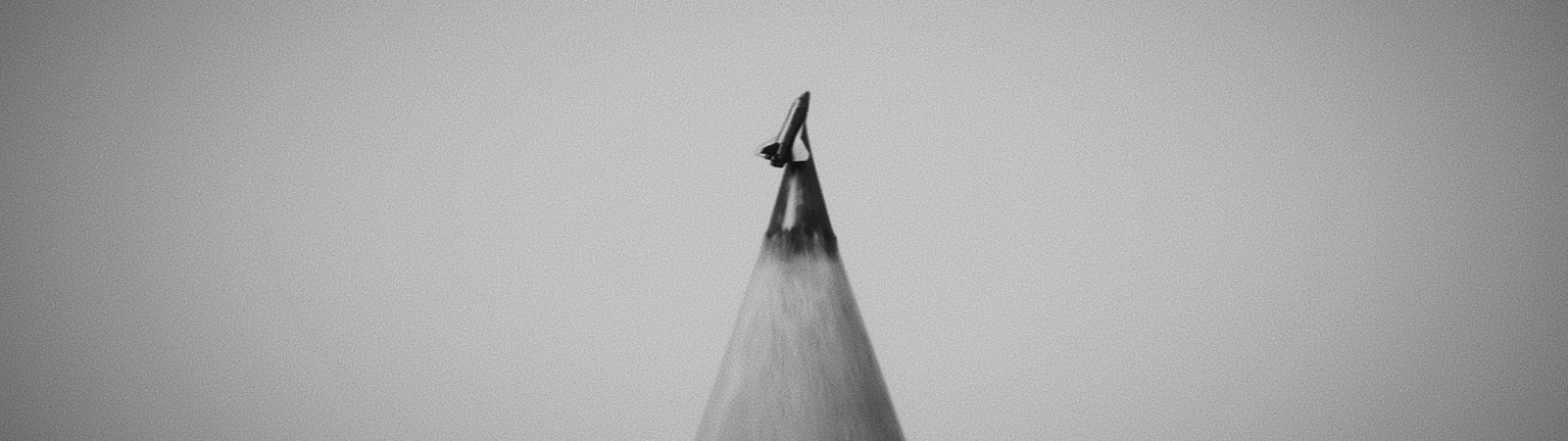 a pencil with a small object on top