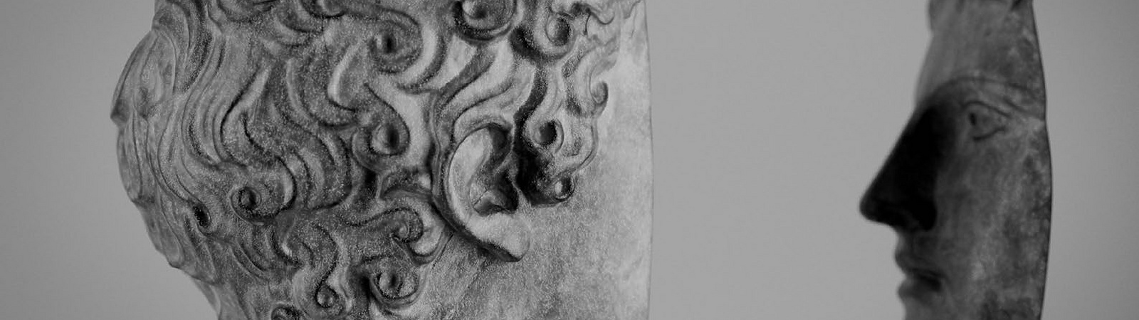 a statue of a person and a person