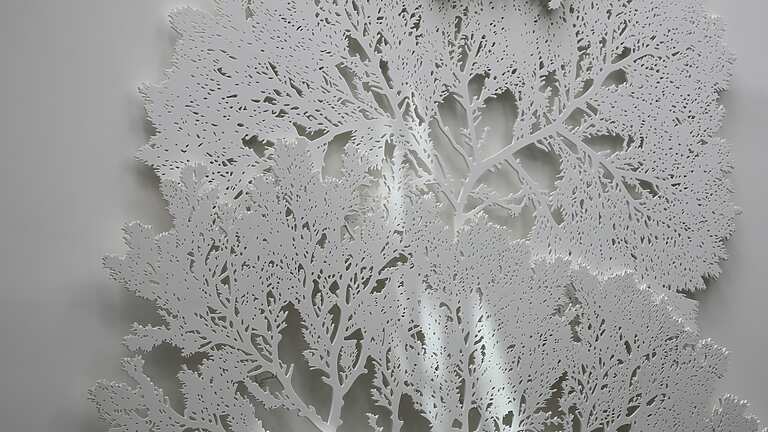 a white tree cut out