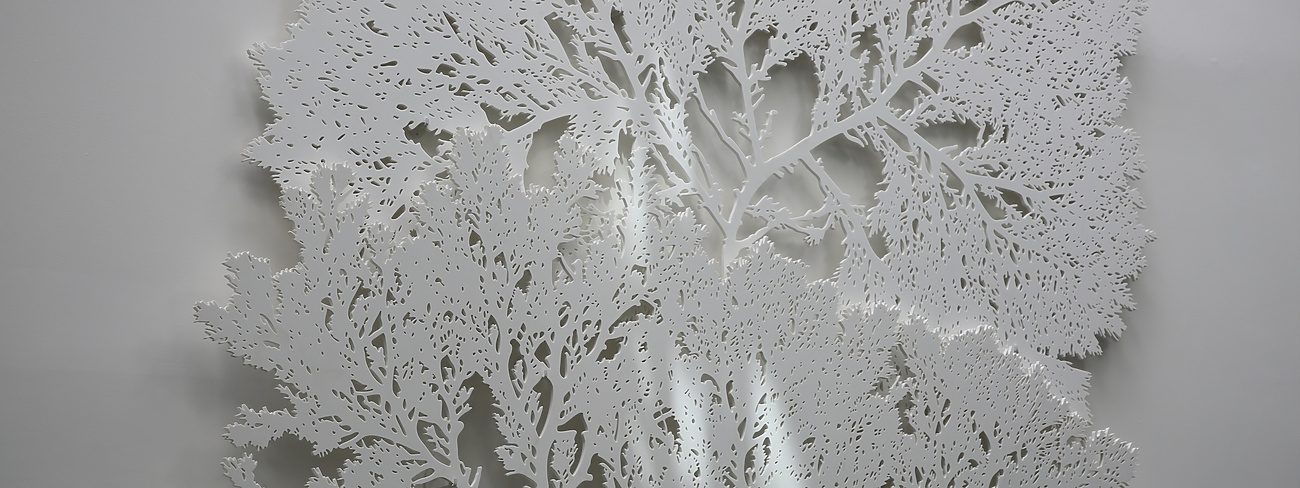 a white tree cut out