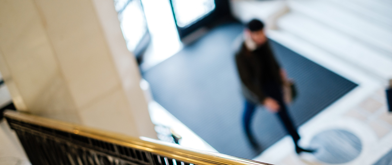 a blurry image of a person walking through Africa house