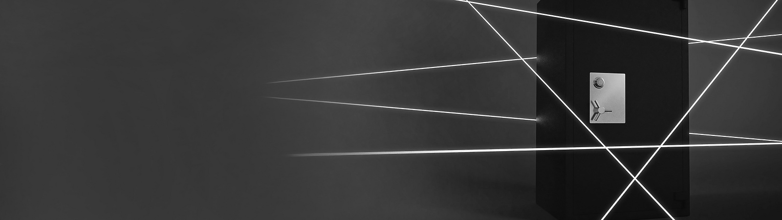 a black rectangular object with white light beams coming out of it