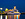 a large white boat in water at night
