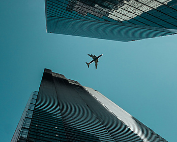 low-angle photography of buildings under clear blue sky during daytime