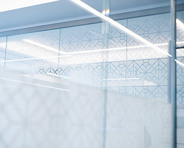 Glass panel with abstract pattern