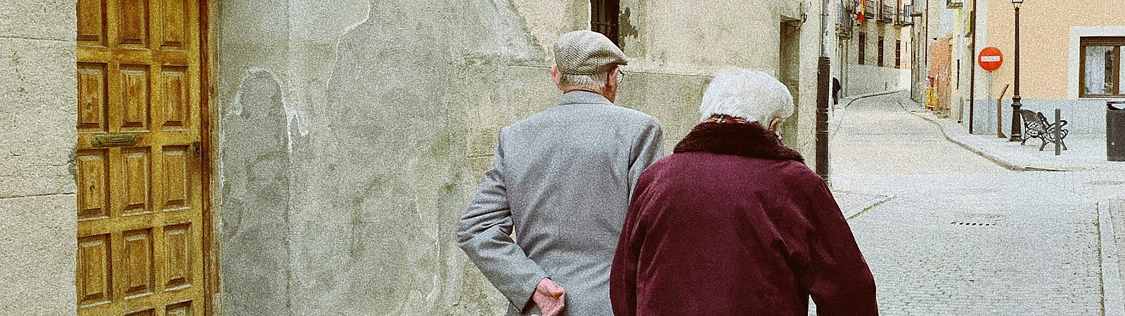 a view of senior couple on a walk
