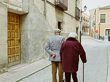 a view of senior couple on a walk