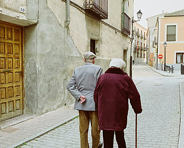 a view of senior couple on a walk