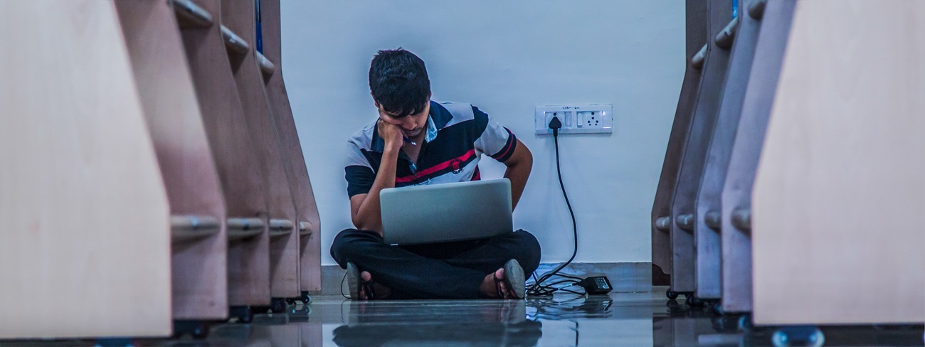 Man studying in library