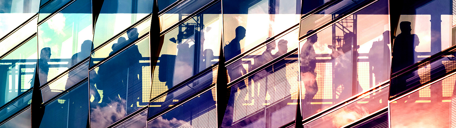 a reflection of people in a building