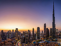 a view of Dubai at sunset