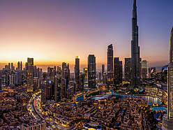 a view of Dubai at sunset