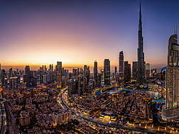 a view of Dubai at sunset