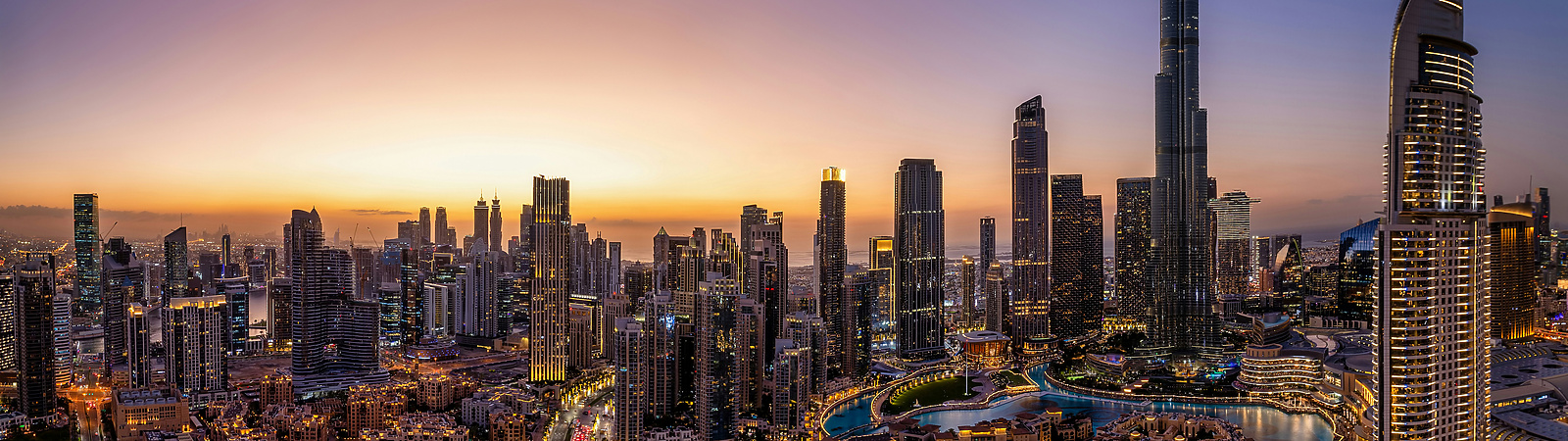 a view of Dubai at sunset
