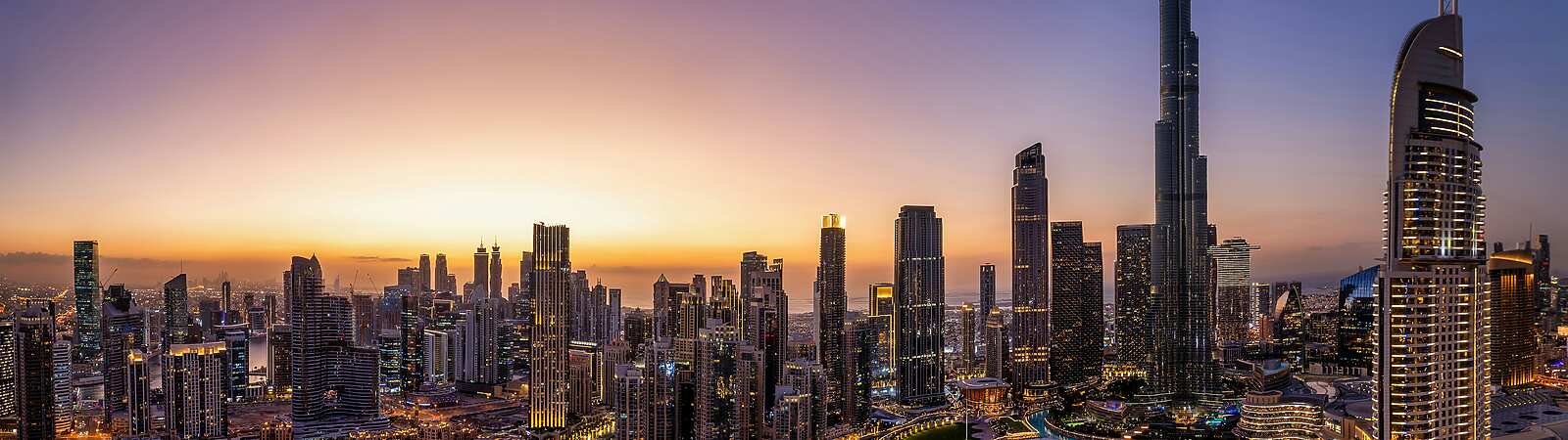 a view of Dubai at sunset