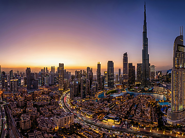 a view of Dubai at sunset