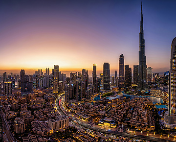 a view of Dubai at sunset