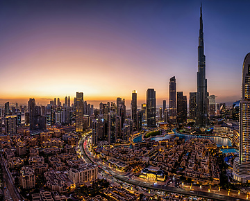 a view of Dubai at sunset