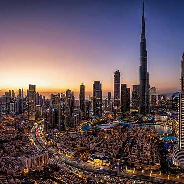 a view of Dubai at sunset