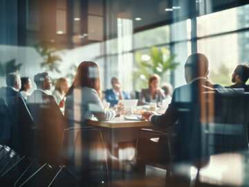 a group of people sitting at a table