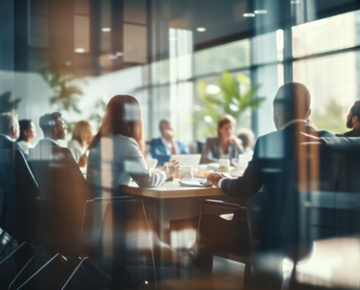 a group of people sitting at a table