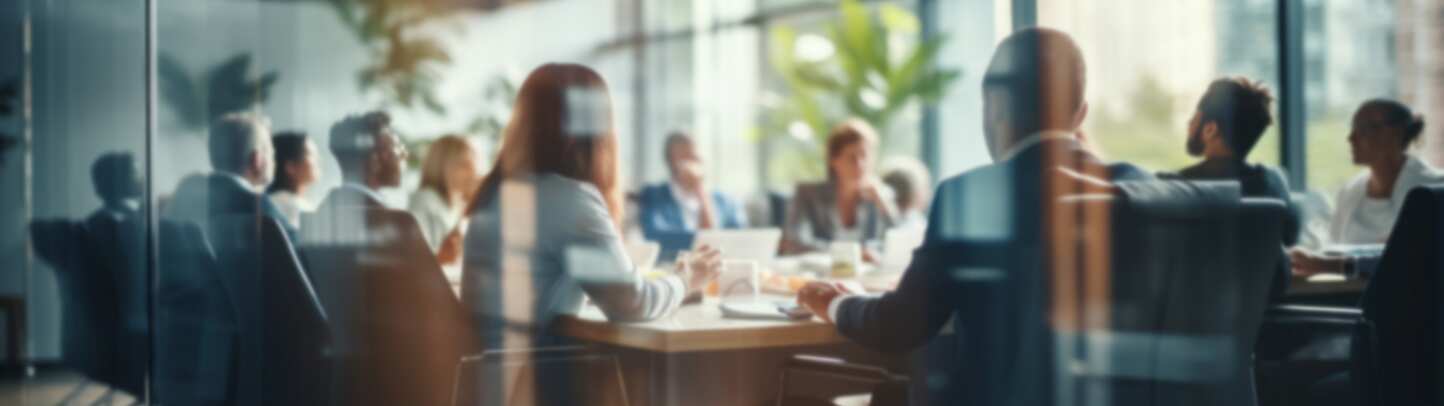 a group of people sitting at a table