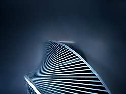 a tall building with persony windows