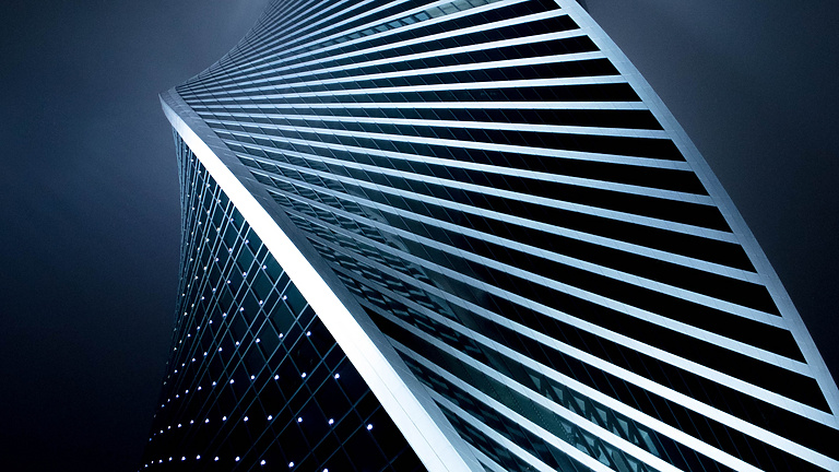 a tall building with persony windows