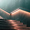 a staircase with lights on the wall