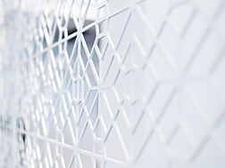 a close up of a white wall