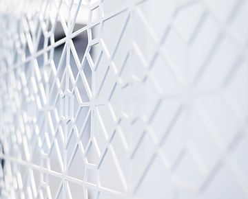 a close up of a white wall