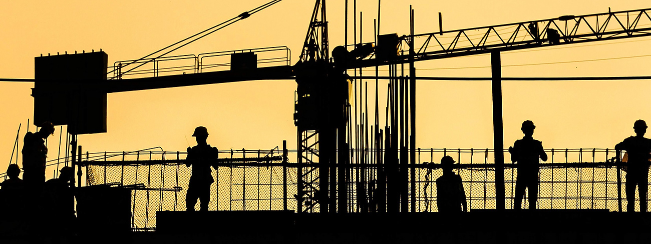 silhouette of people on a building