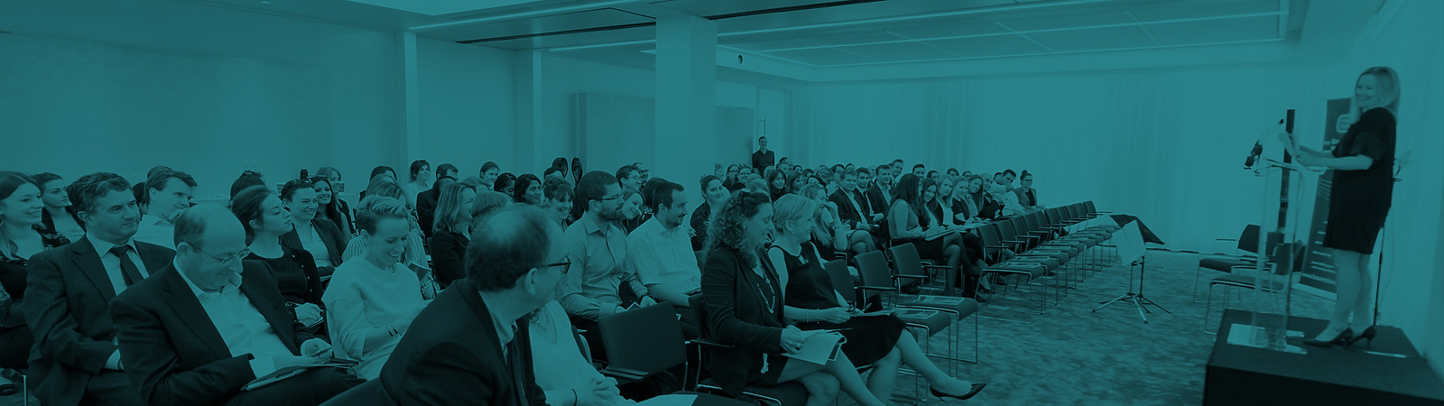 a group of people sitting in chairs