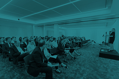a group of people sitting in chairs