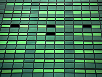 a close up of a green building