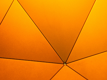 a close up view of a yellow umbrella