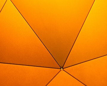 a close up view of a yellow umbrella