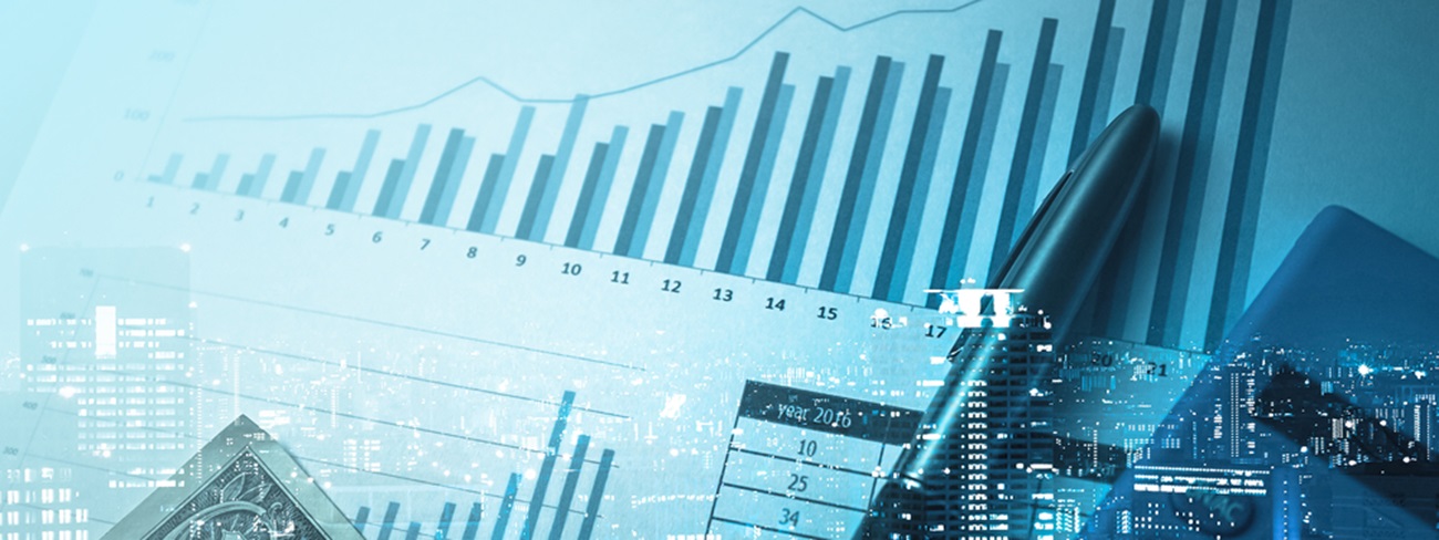 financial graph with office equipment on top