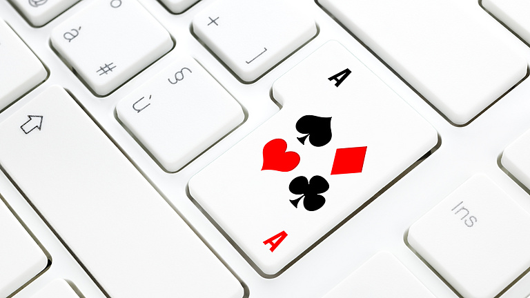 playing card on a keyboard