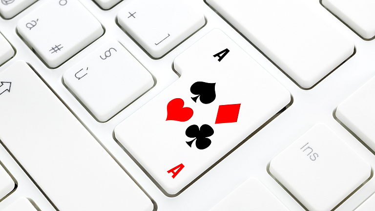 playing card on a keyboard