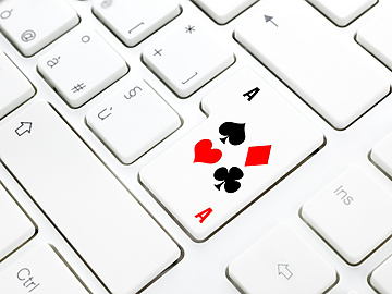 playing card on a keyboard