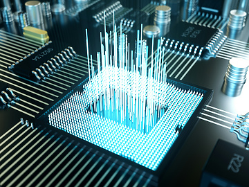 Close-up image of a microchip on a circuit board with glowing blue data streams rising from its surface, symbolizing digital data processing and advanced technology.