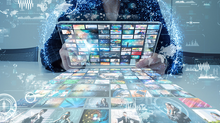 Person using immersive business interface in blurry office