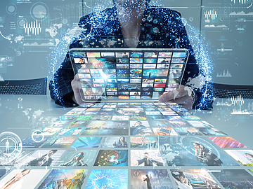 Person using immersive business interface in blurry office