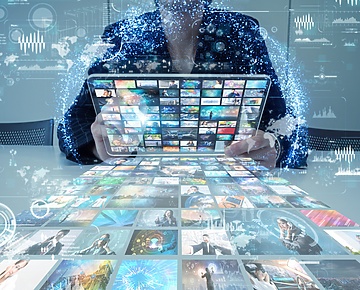 Person using immersive business interface in blurry office