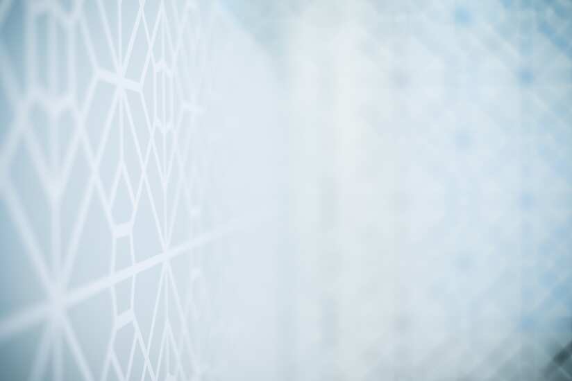a white wall with a pattern