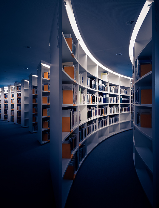 a room with shelves of books