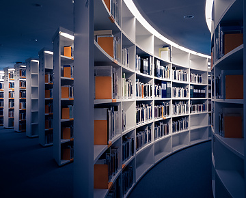 a room with shelves of books