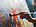 Paintbrush painting over abstract art